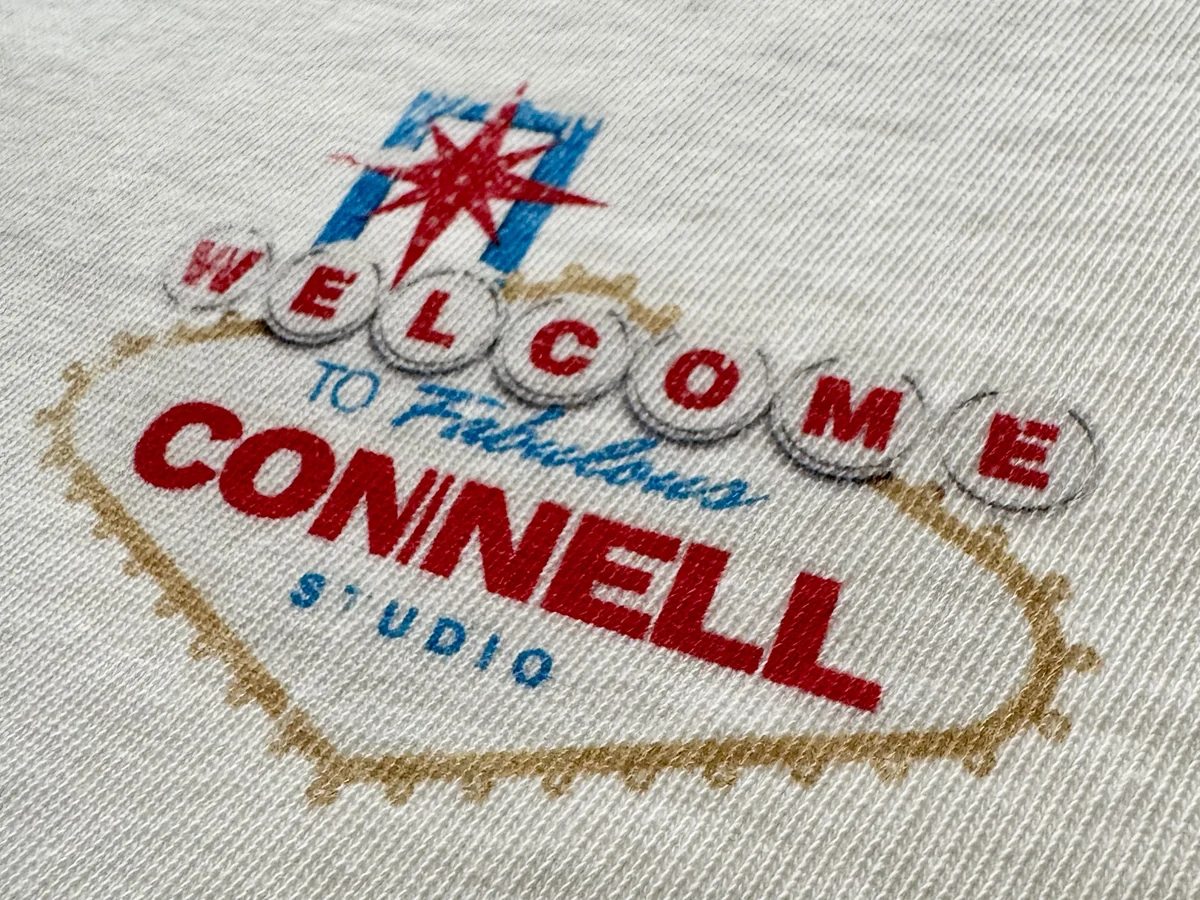 Detailed direct-to-garment print on a light tee